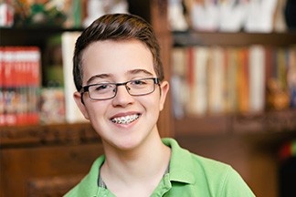 Teen in glasses with braces